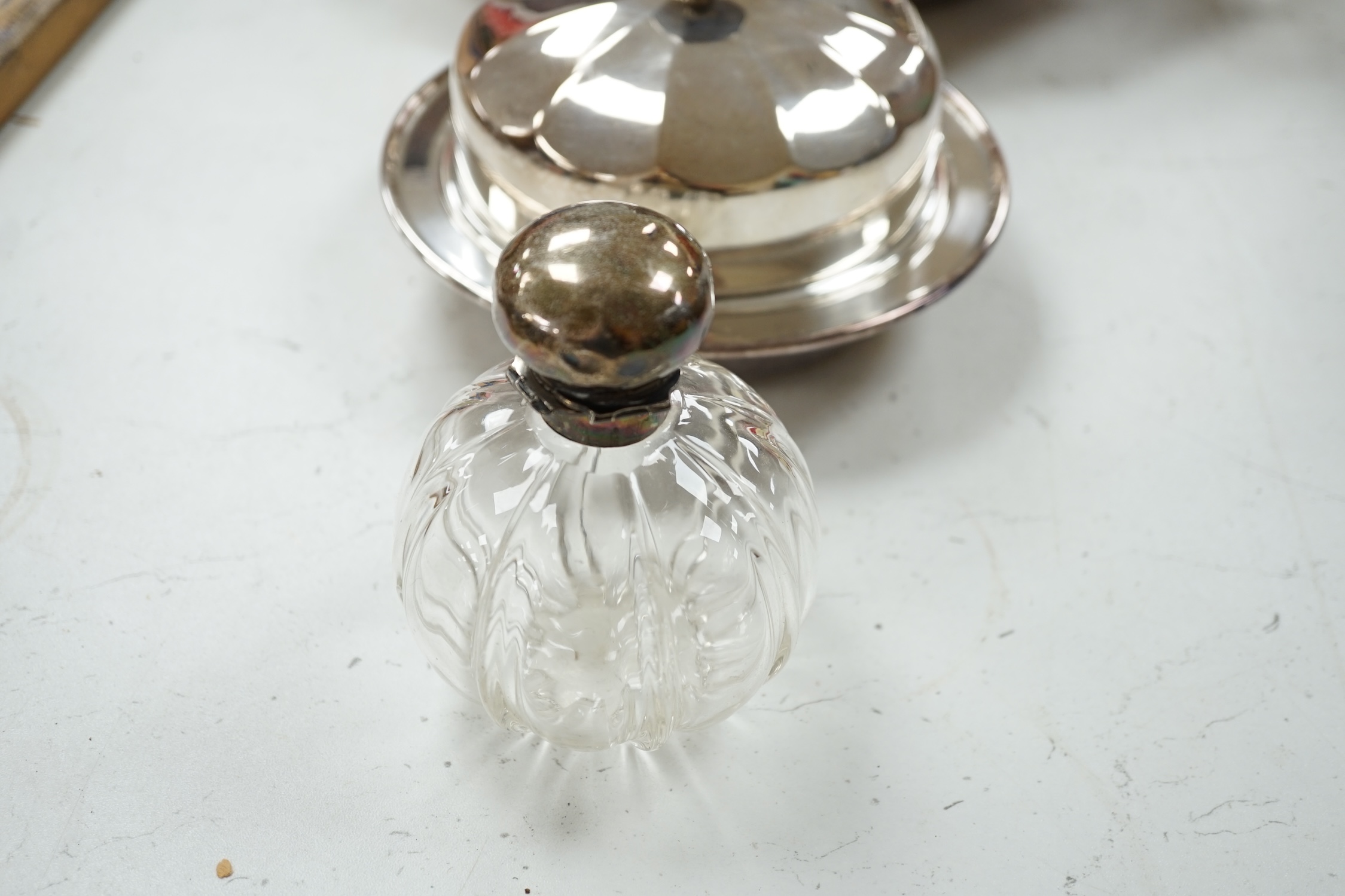 A silver mounted perfume bottle and quantity of plate. Condition - fair to good